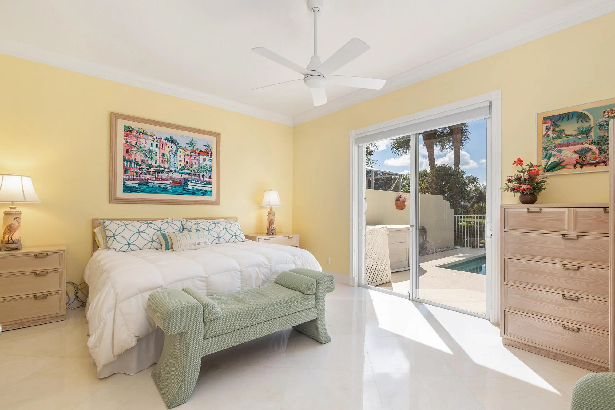 Enormous master bedroom with serene water views