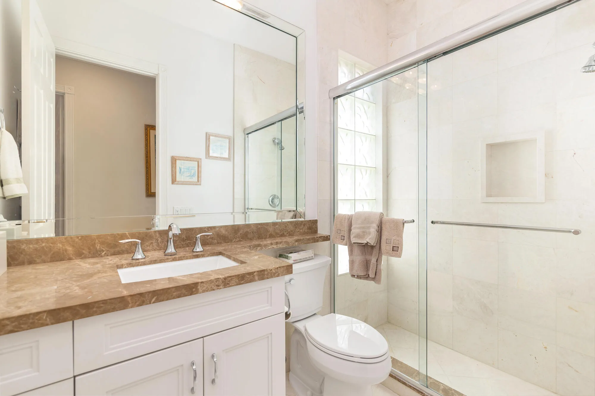 Custom 2nd bathroom, white marble shower & frameless shower doors