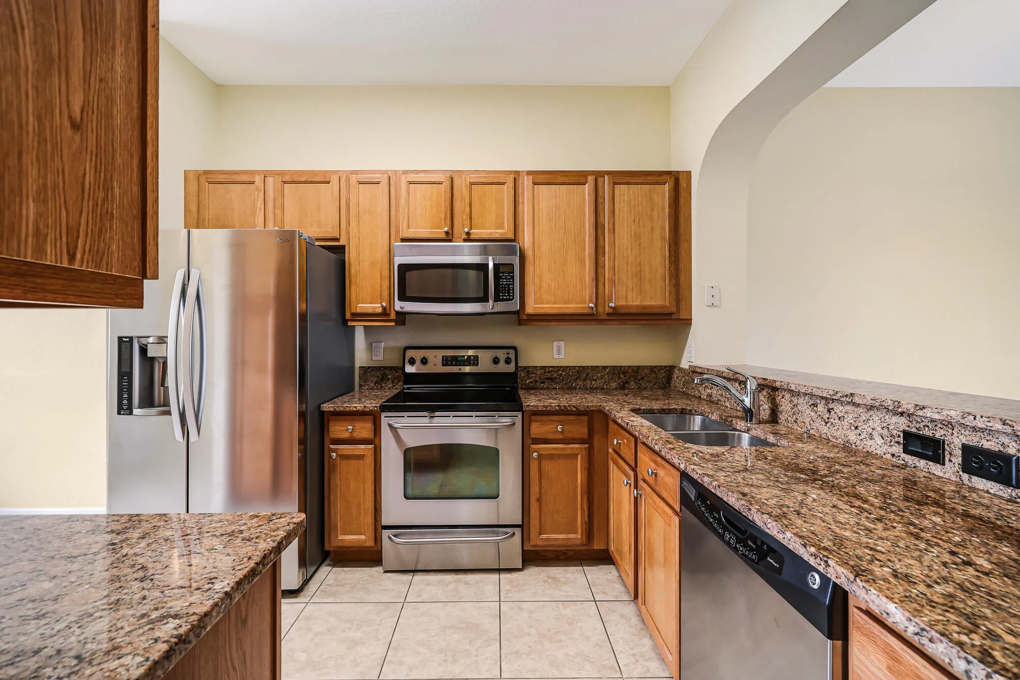 Real Oak cabinets, SS appliances, and granite countertops.