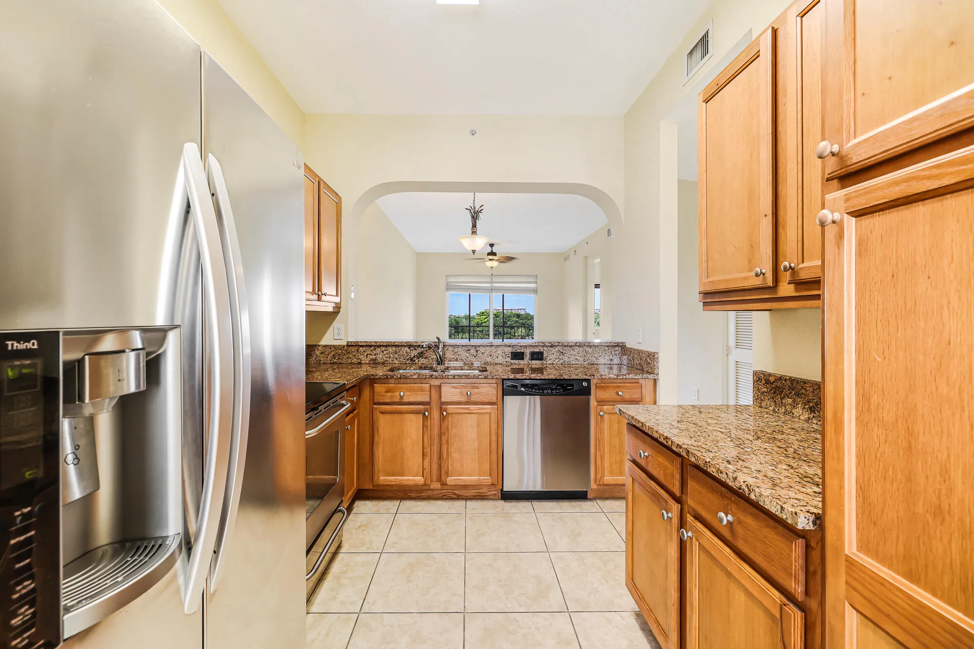 Real Oak cabinets, SS appliances, and granite countertops.