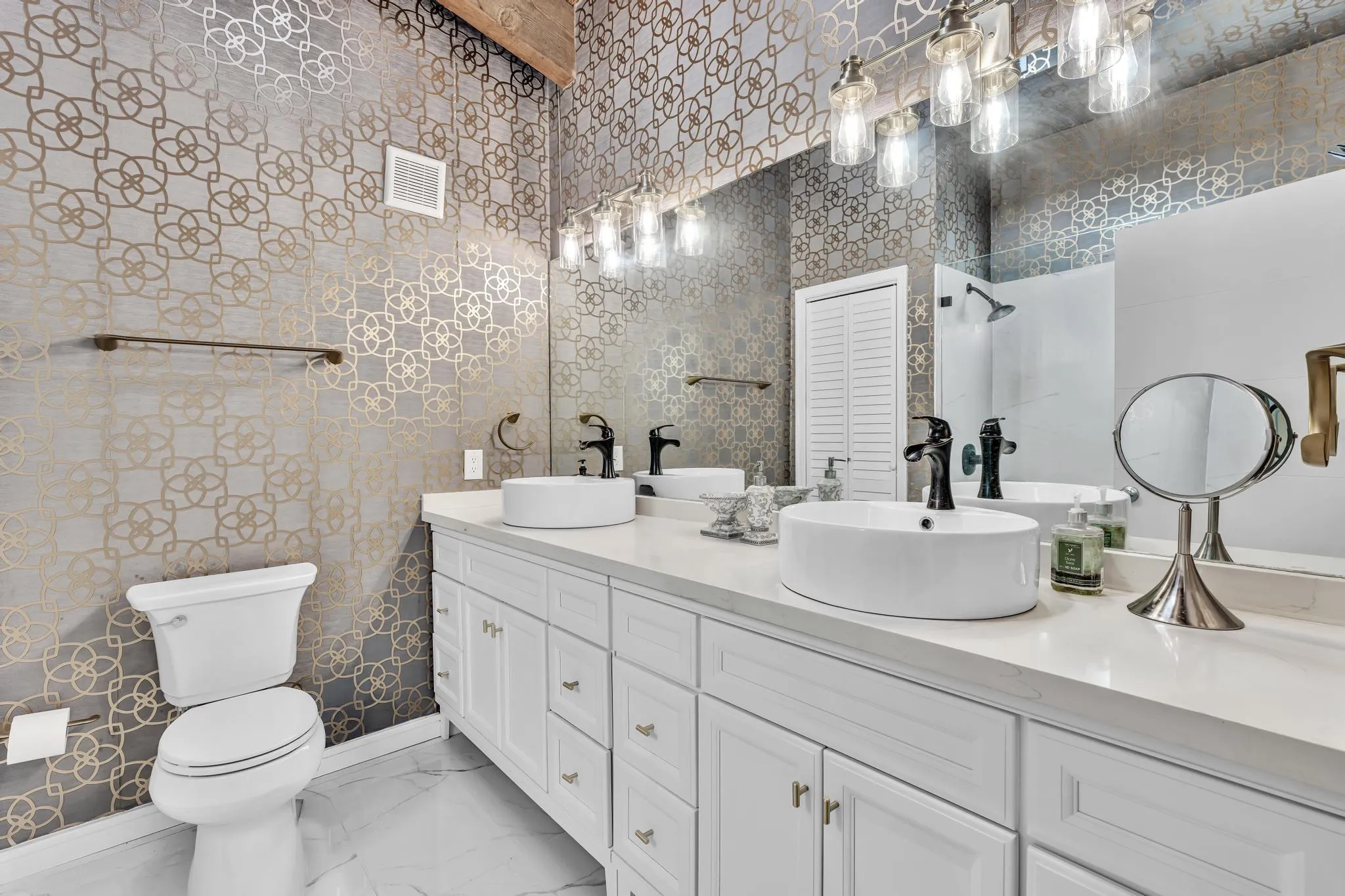 Master Bathroom with double vanity and expansive counter space.