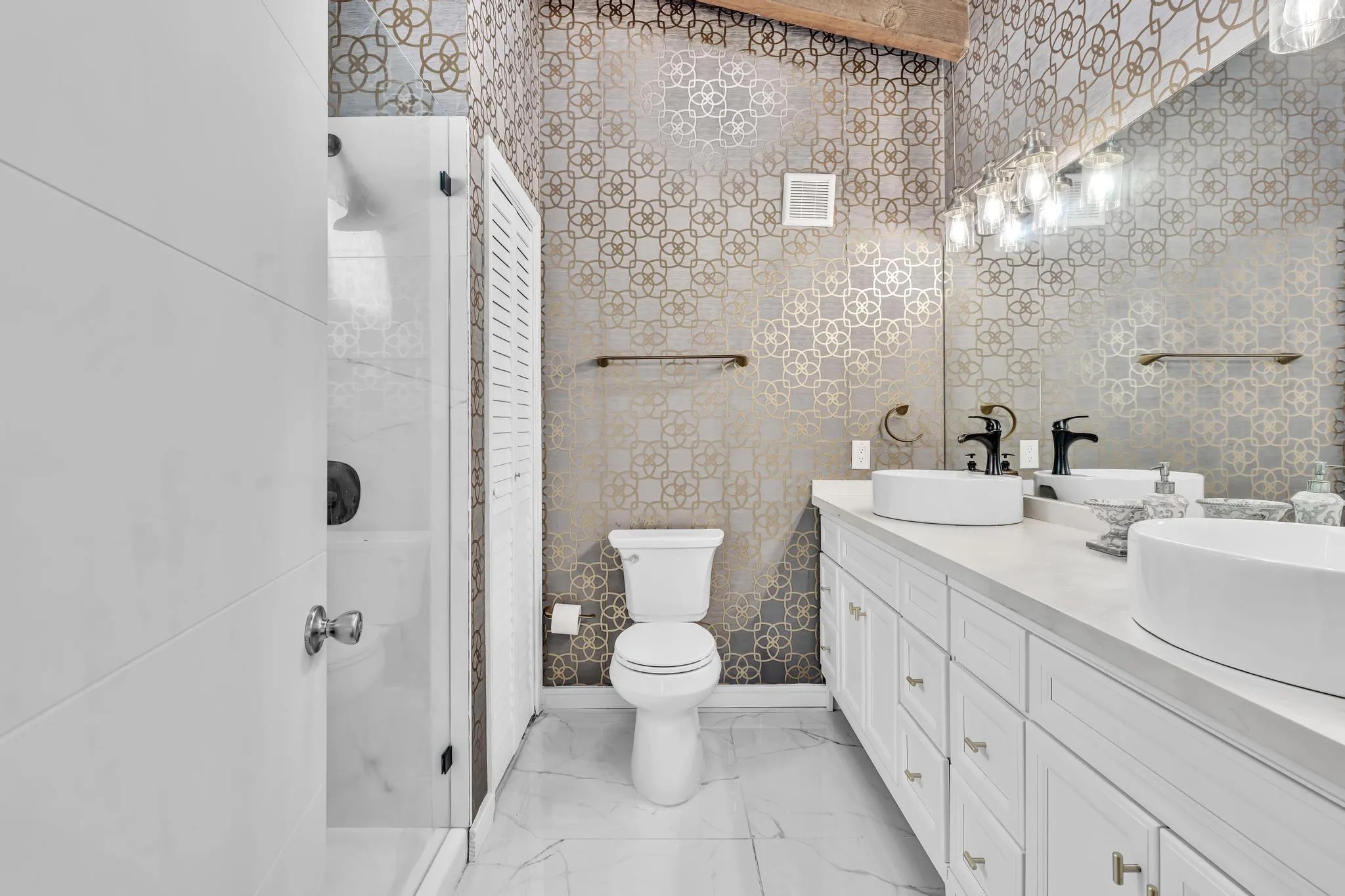 Master Bathroom with double vanity and expansive counter space.