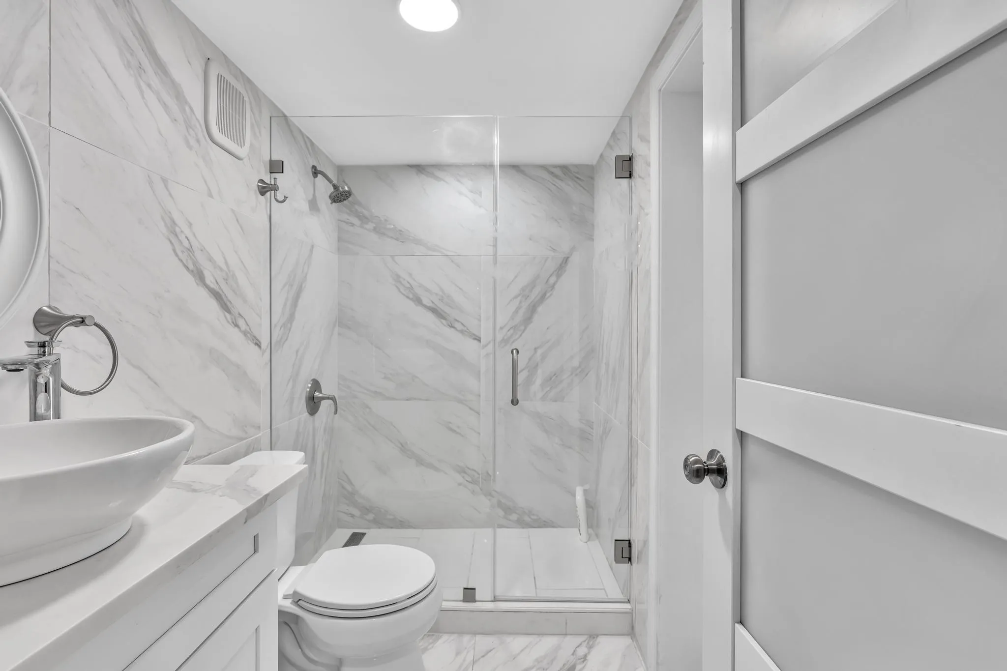 Downstairs Bathroom for guests as well as jack and jill connection to third bedroom.