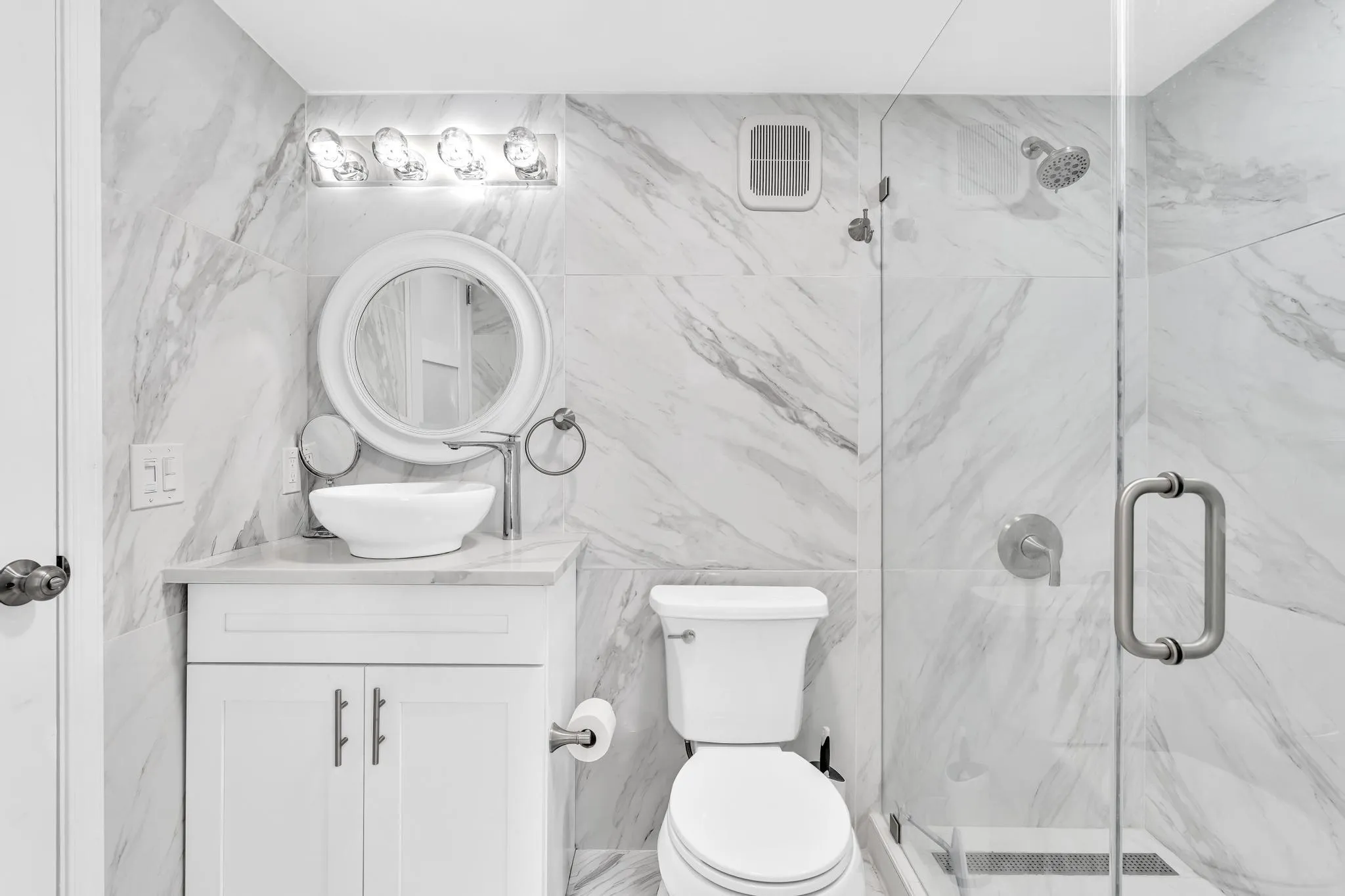 Downstairs Bathroom for guests as well as jack and jill connection to third bedroom.