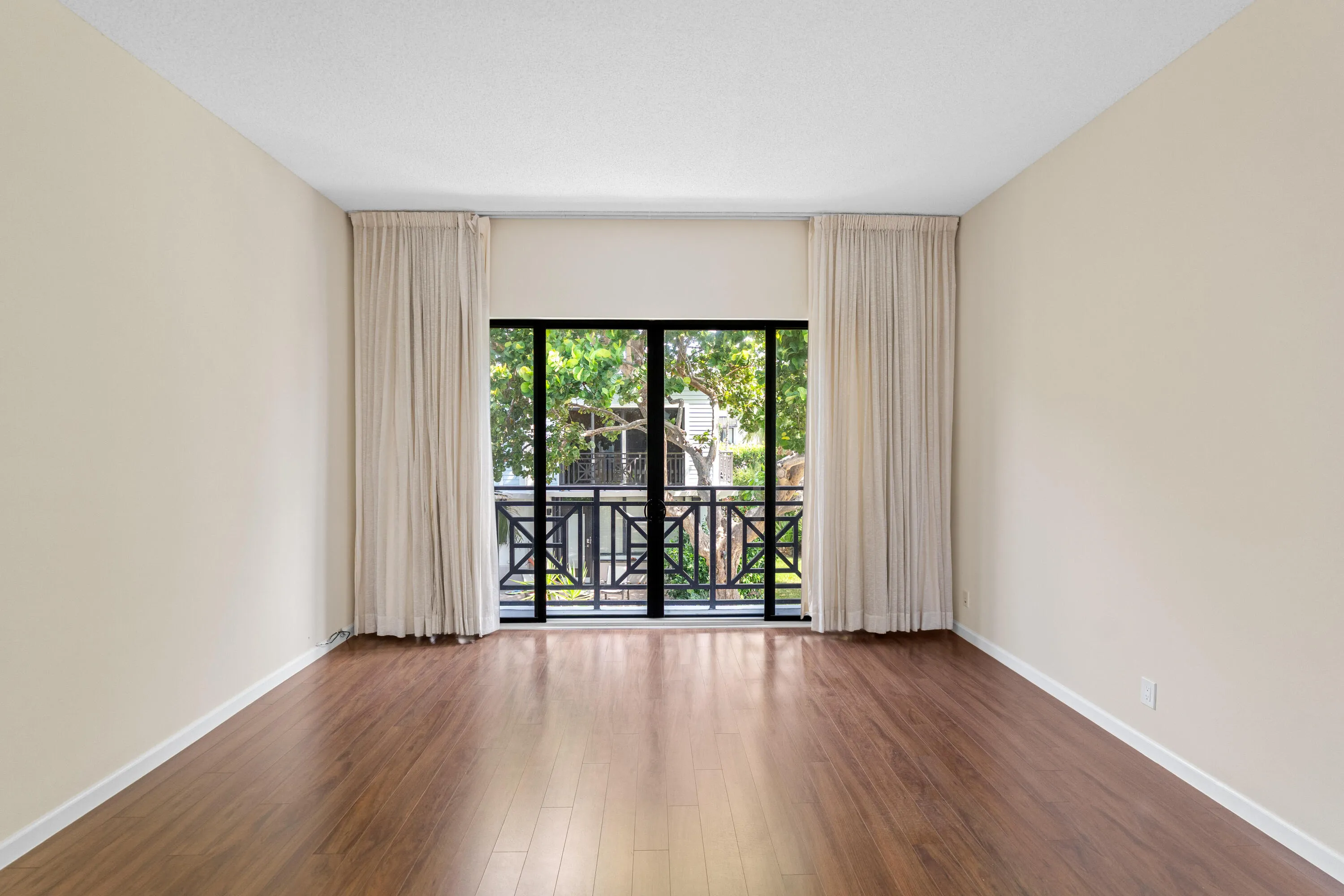 Family room with Juliet balcony/sliders