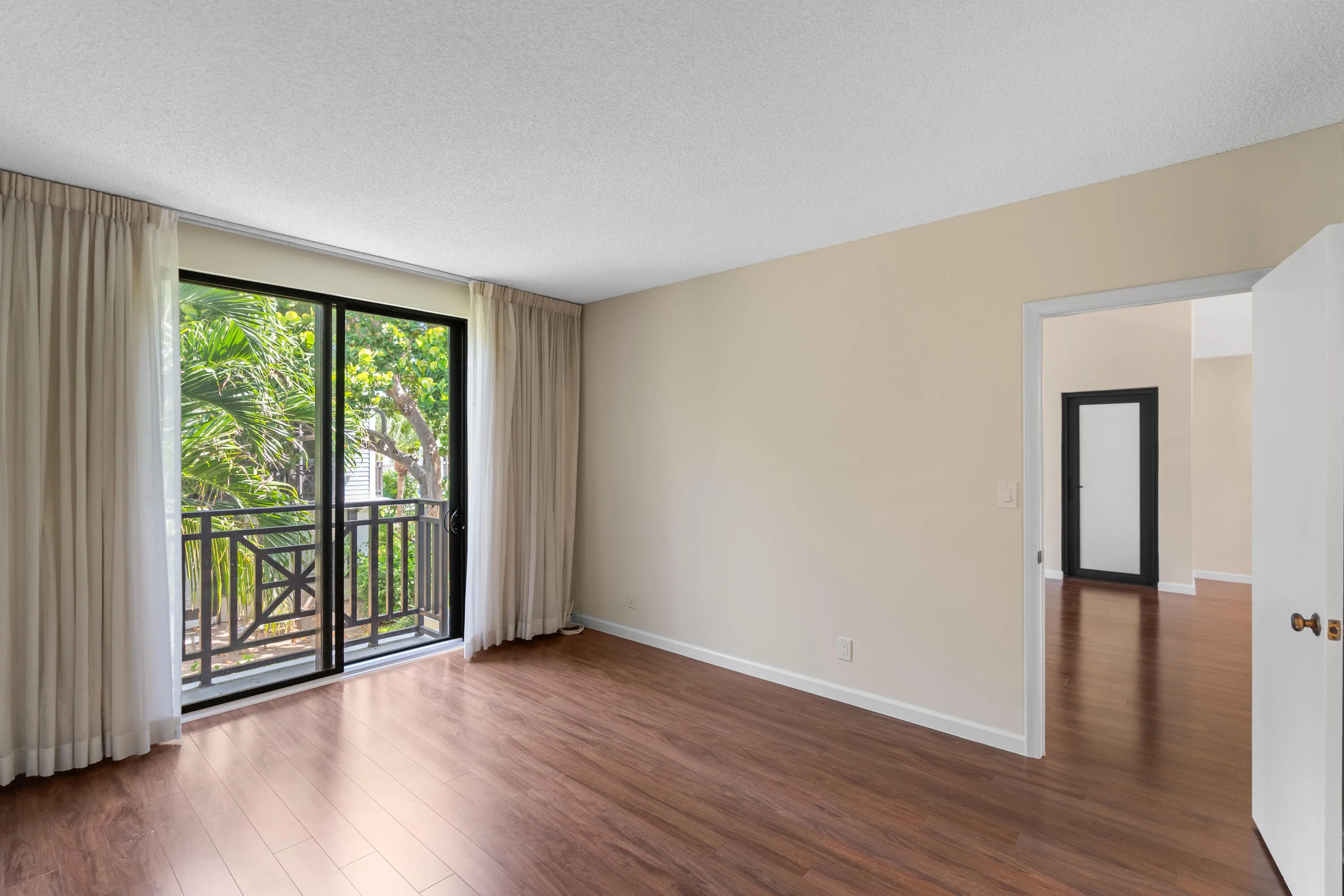 Primary bedroom with sliders