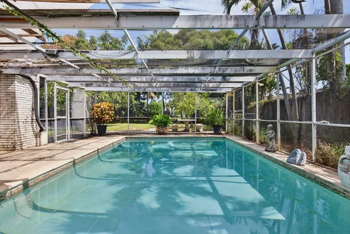 Large private pool provides an excellent foundation for an updated outdoor entertainment area.