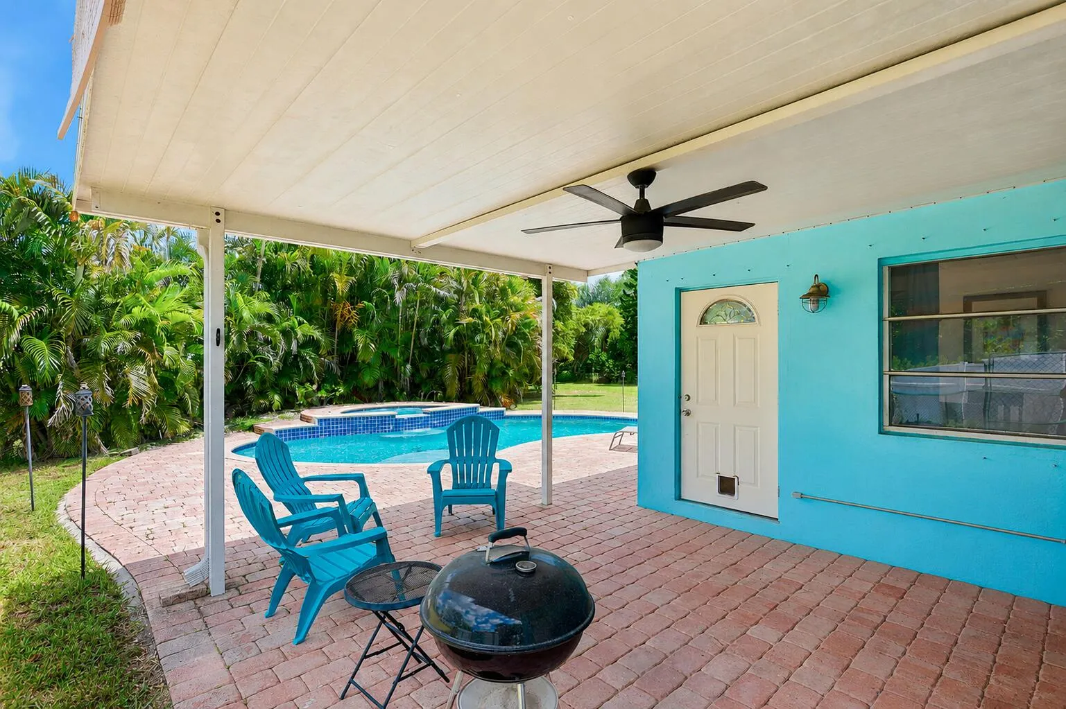 Oversized paver patio with shaded overhang