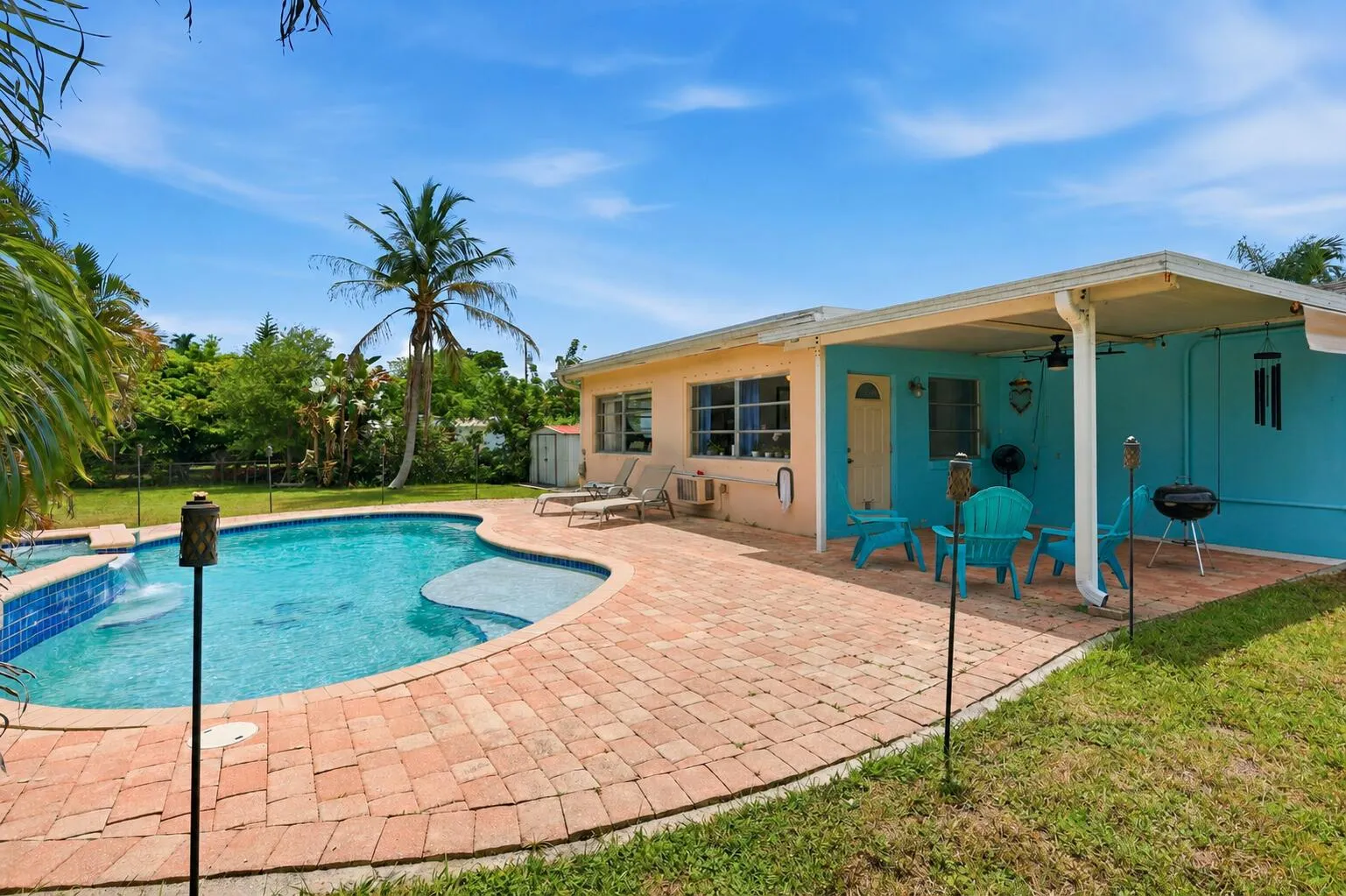 Oversized paver patio with shaded overhang