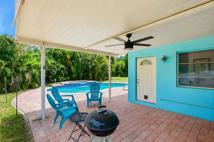 Oversized paver patio with shaded overhang