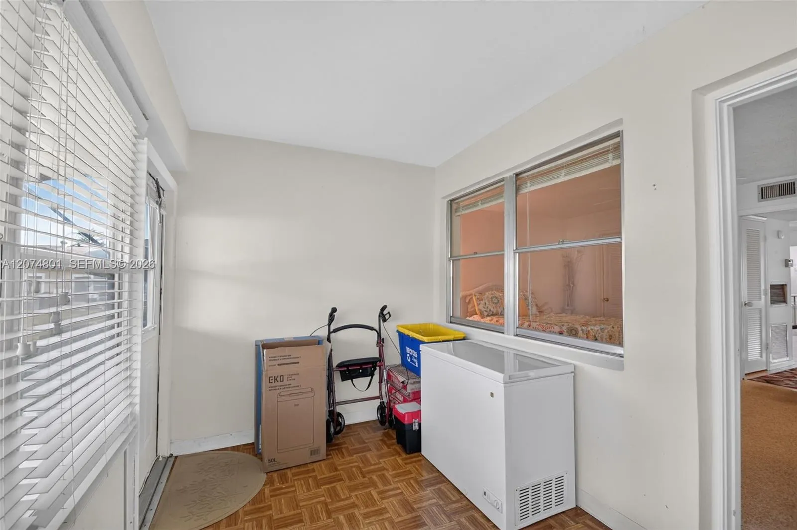 Enclosed and A/Ced Florida Room gives an additional 128 sq ft of living space