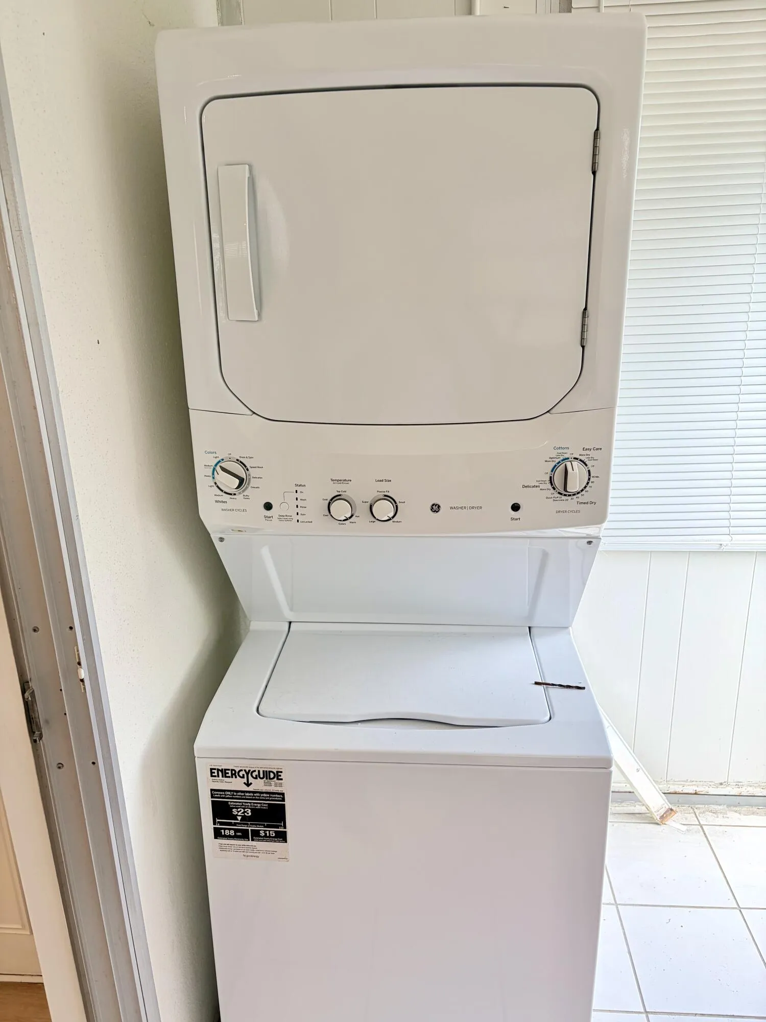 White stackable washer and dryer unit