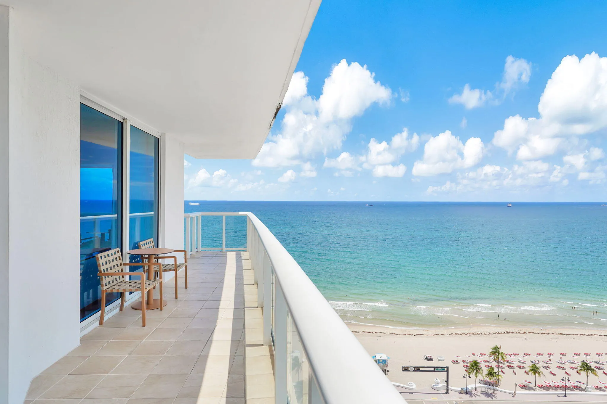 approx. 320 SF wraparound balcony showcasing sweeping SE ocean views