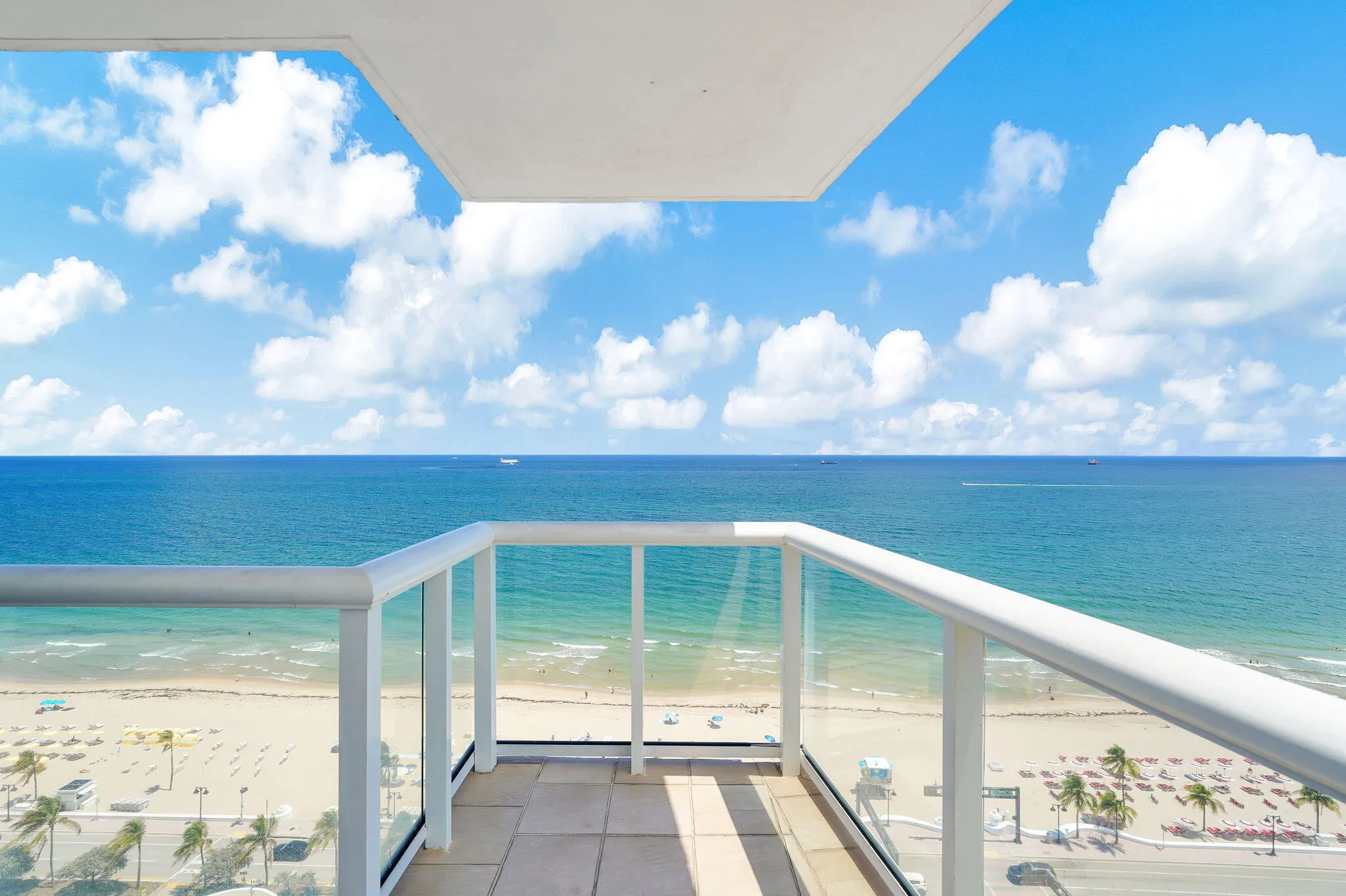 approx. 320 SF wraparound balcony showcasing sweeping SE ocean views