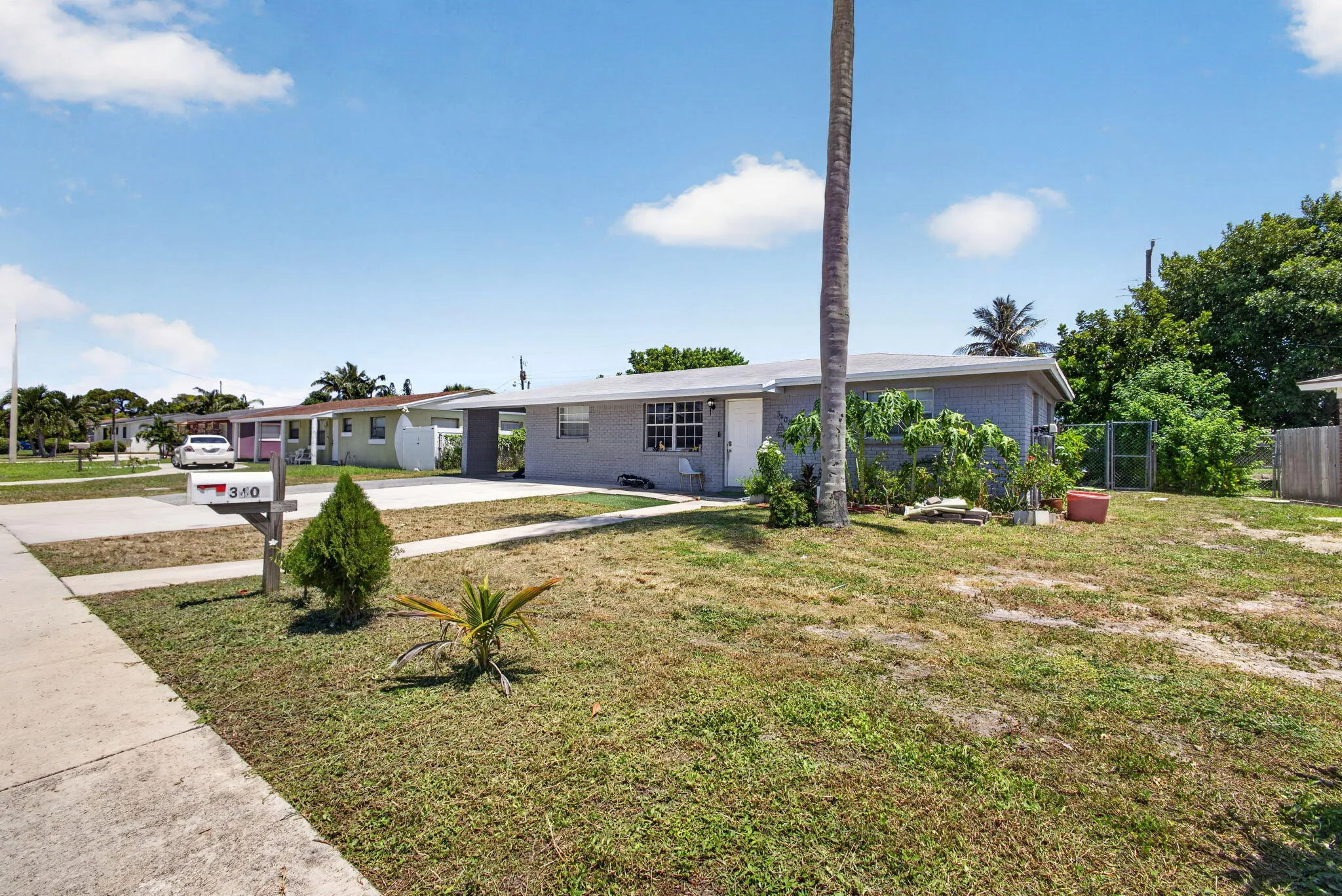 Single-story property with a gray painted exterior