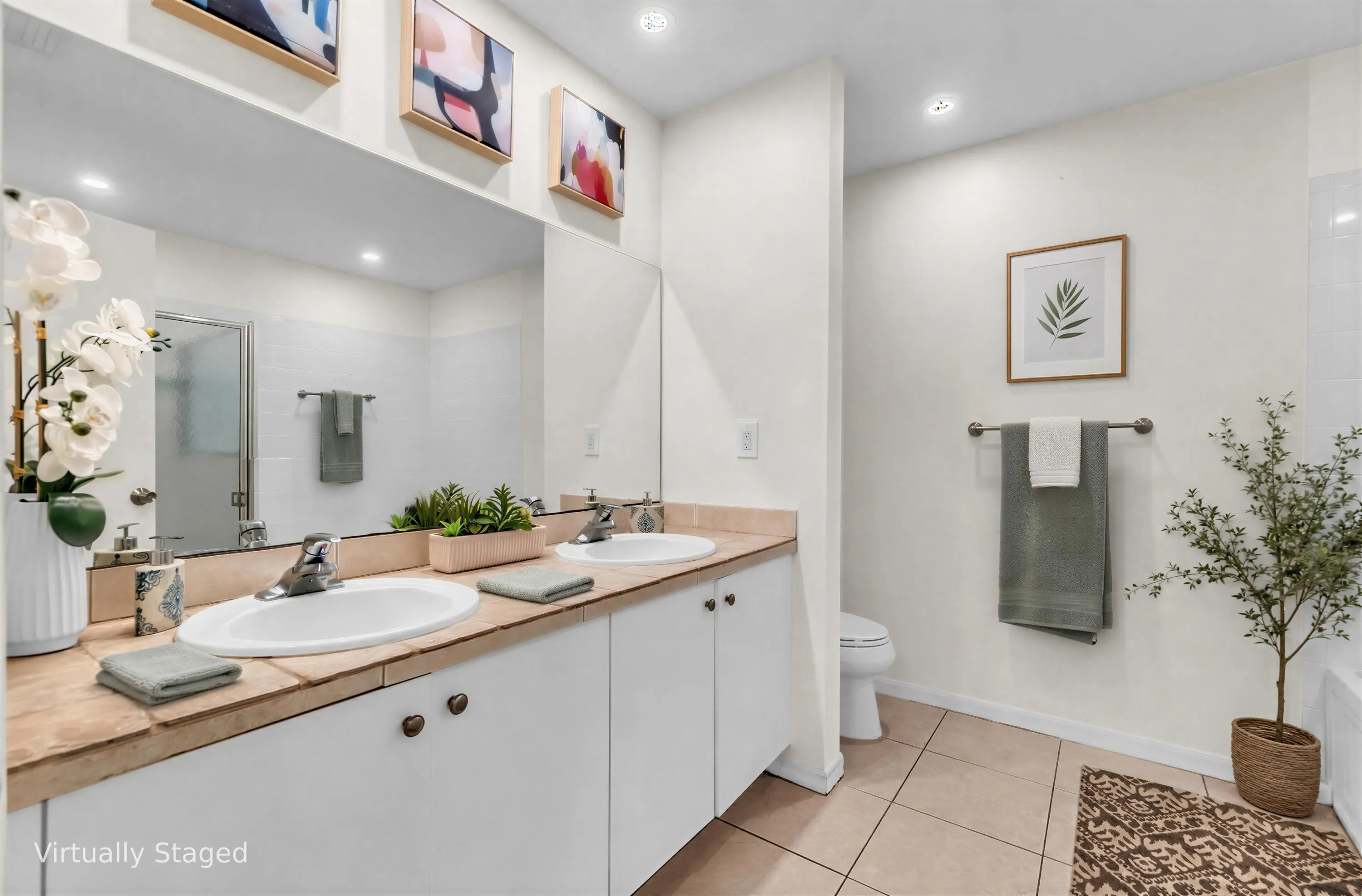 Dual vanity with integrated sinks and stone-look countertop