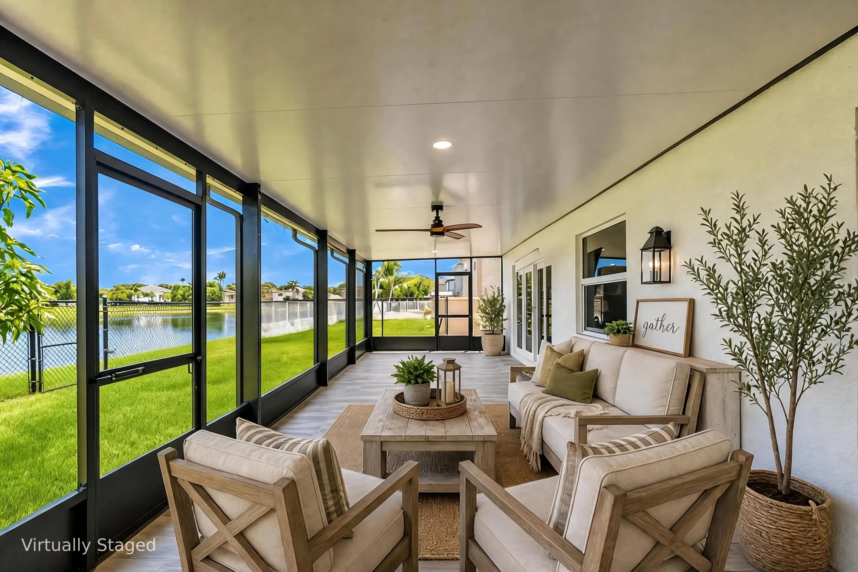 Screened-in porch featuring wood-finish flooring, a ceiling fan, and multiple exterior doors