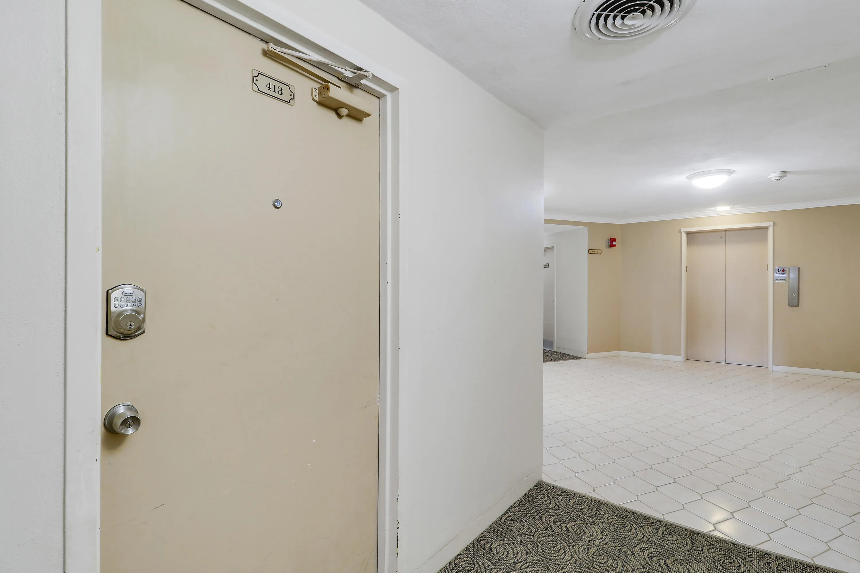 Entry Door/Steps from Elevators