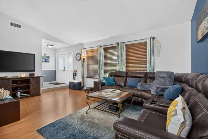 Wood-finish flooring throughout the living area