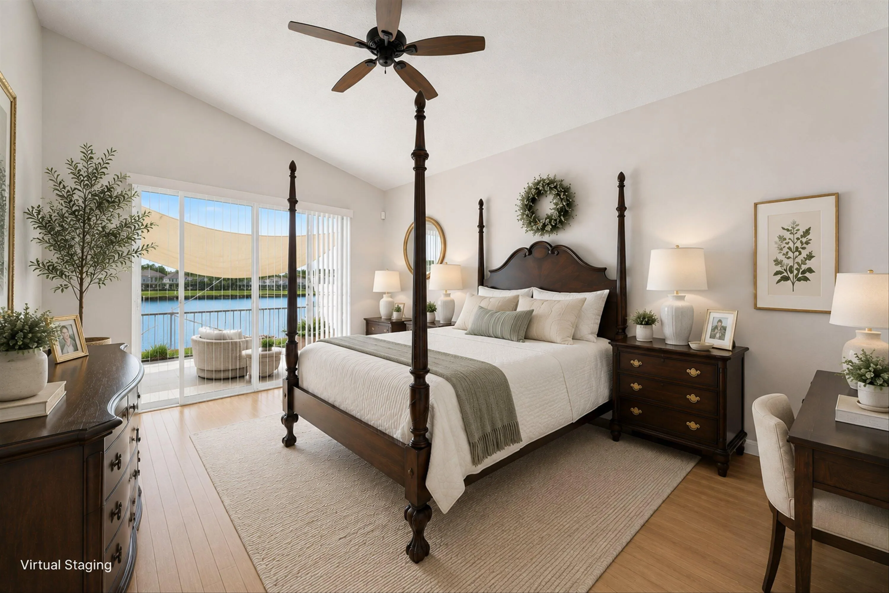 Vaulted ceiling with a ceiling fan, light wood-finish flooring, and sliding glass doors leading to an outdoor space