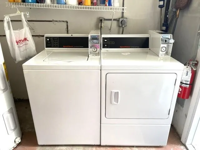 Shared coin operated washer and dryer