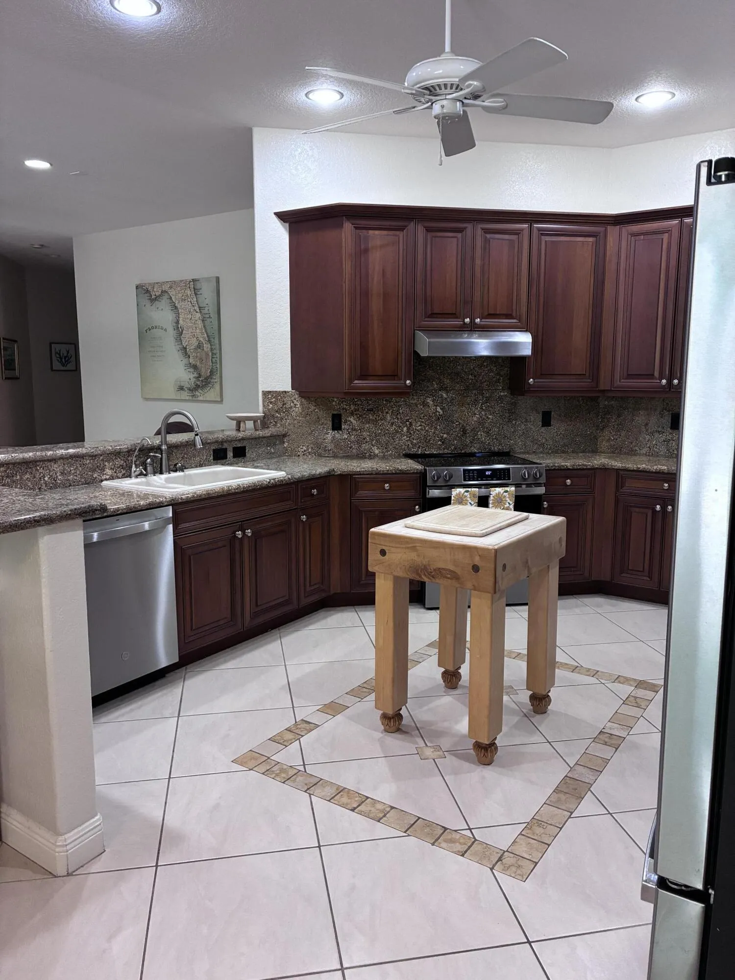 Kitchen with new SS dishwasher and new SS oven