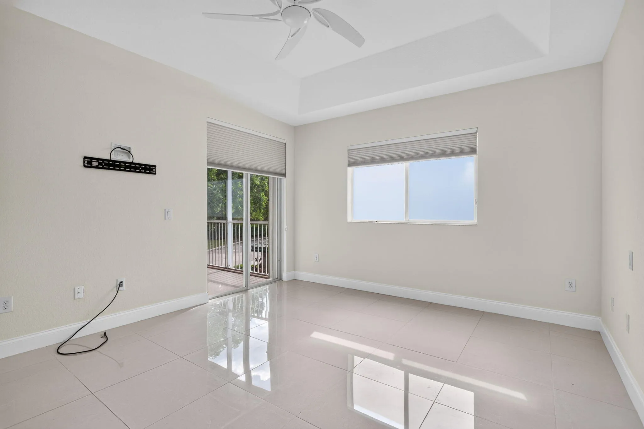 Primary Bedroom with access to balcony