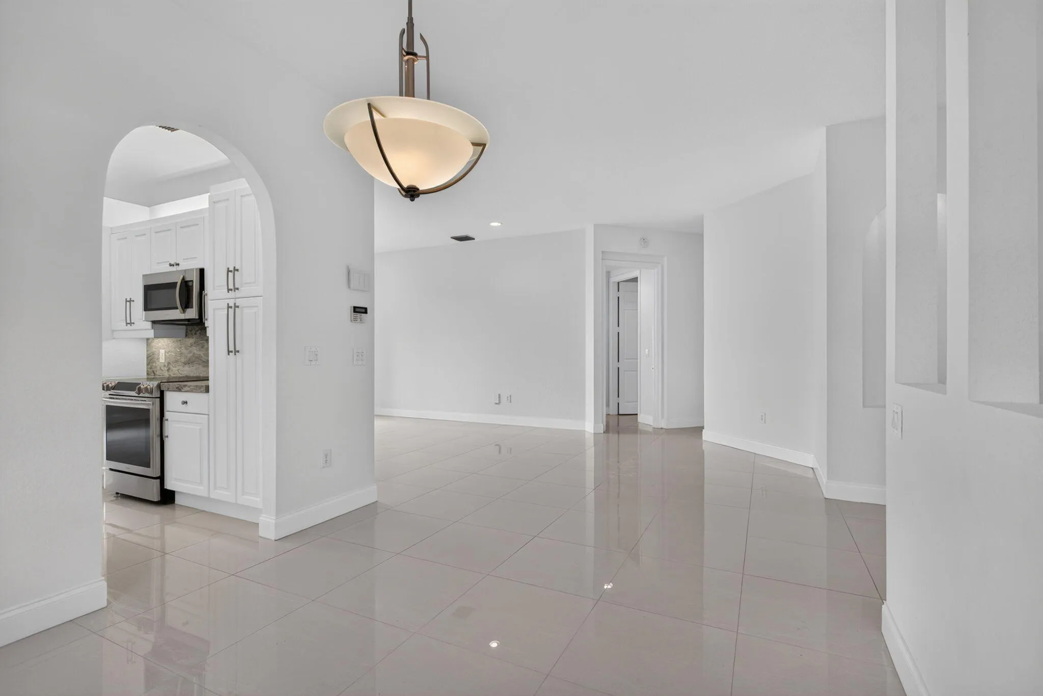 Hallway to living room and kitchen
