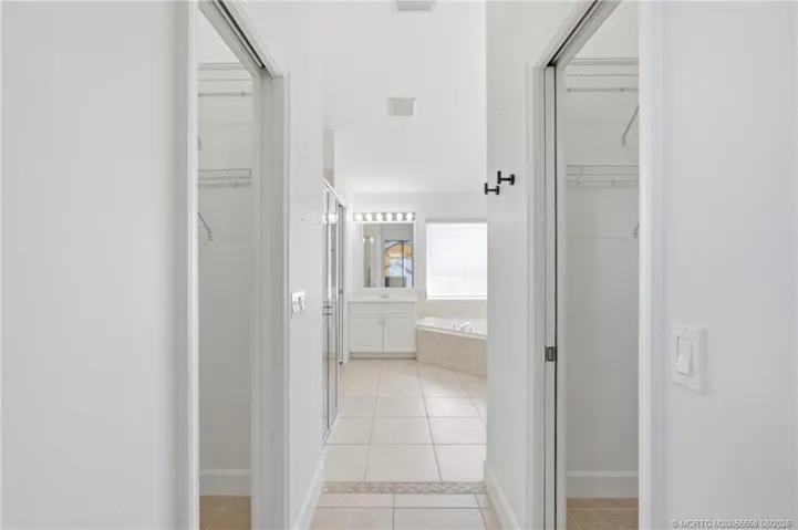 His and hers closets in the primary suite.
