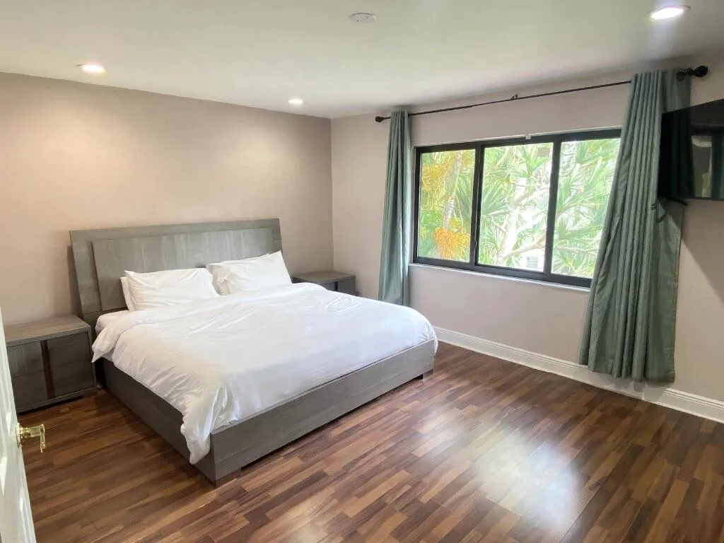 Master bedroom is a very large that a king bed fits and you still have more space
