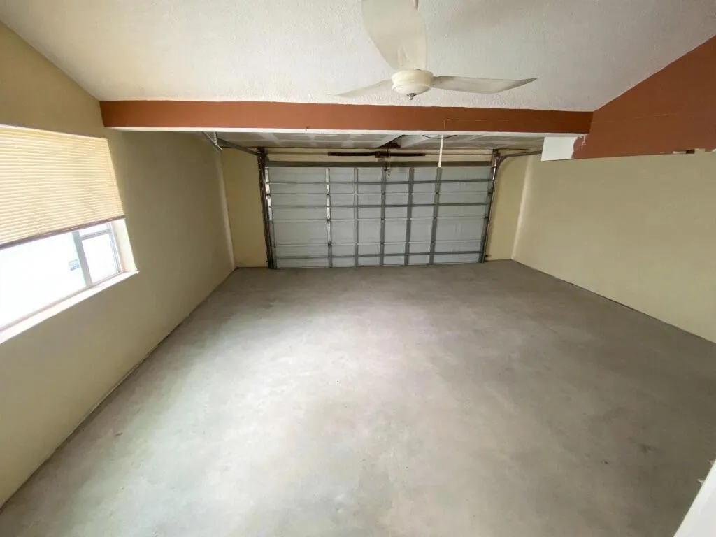 2 car garage doors are electrical. and also has a window.