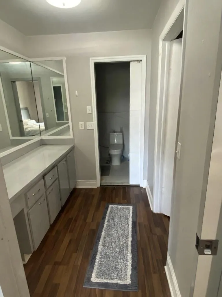 once side are the dual sinks and the other side are the walk in closet.