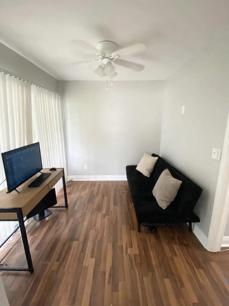 Office room has the own sliding door to a small patio. located in the first floor.