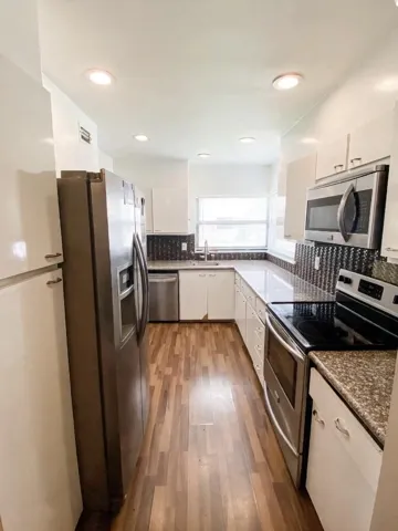 Kitchen has a lot of storage and also a big pantry