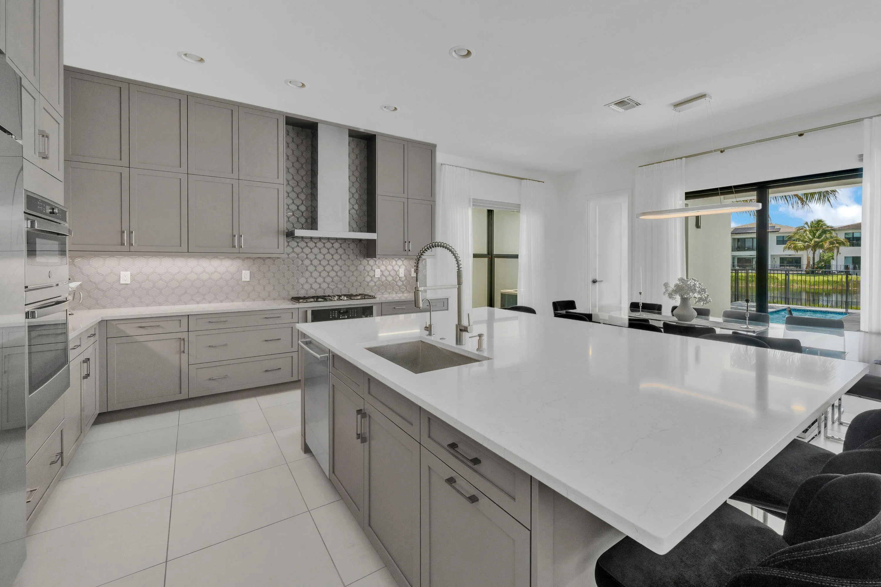 Kitchen — island & range wall