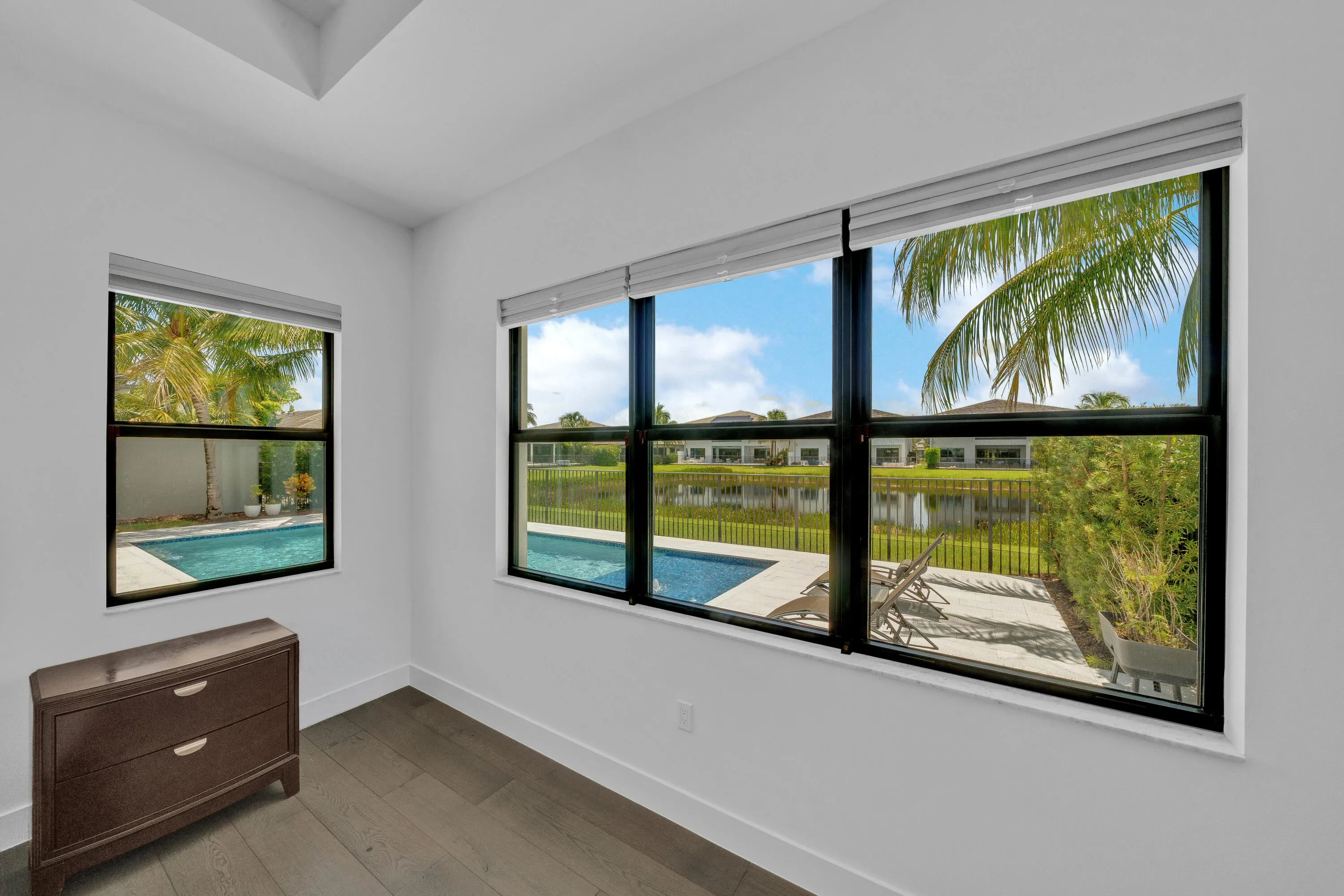 Primary suite — pool & lake outlook