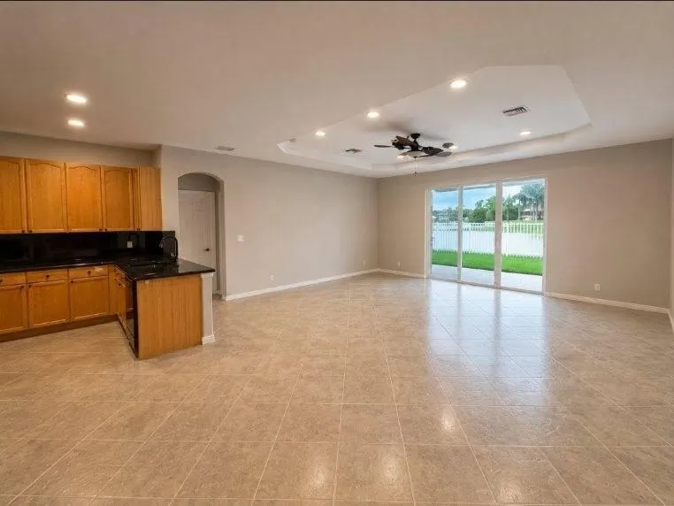 Tiled 1st floor. Spacious Great Room with Lake View