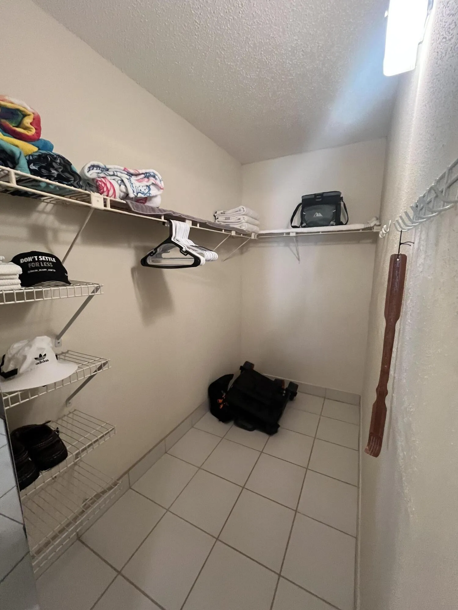 full walk-in closet within the primary bedroom.