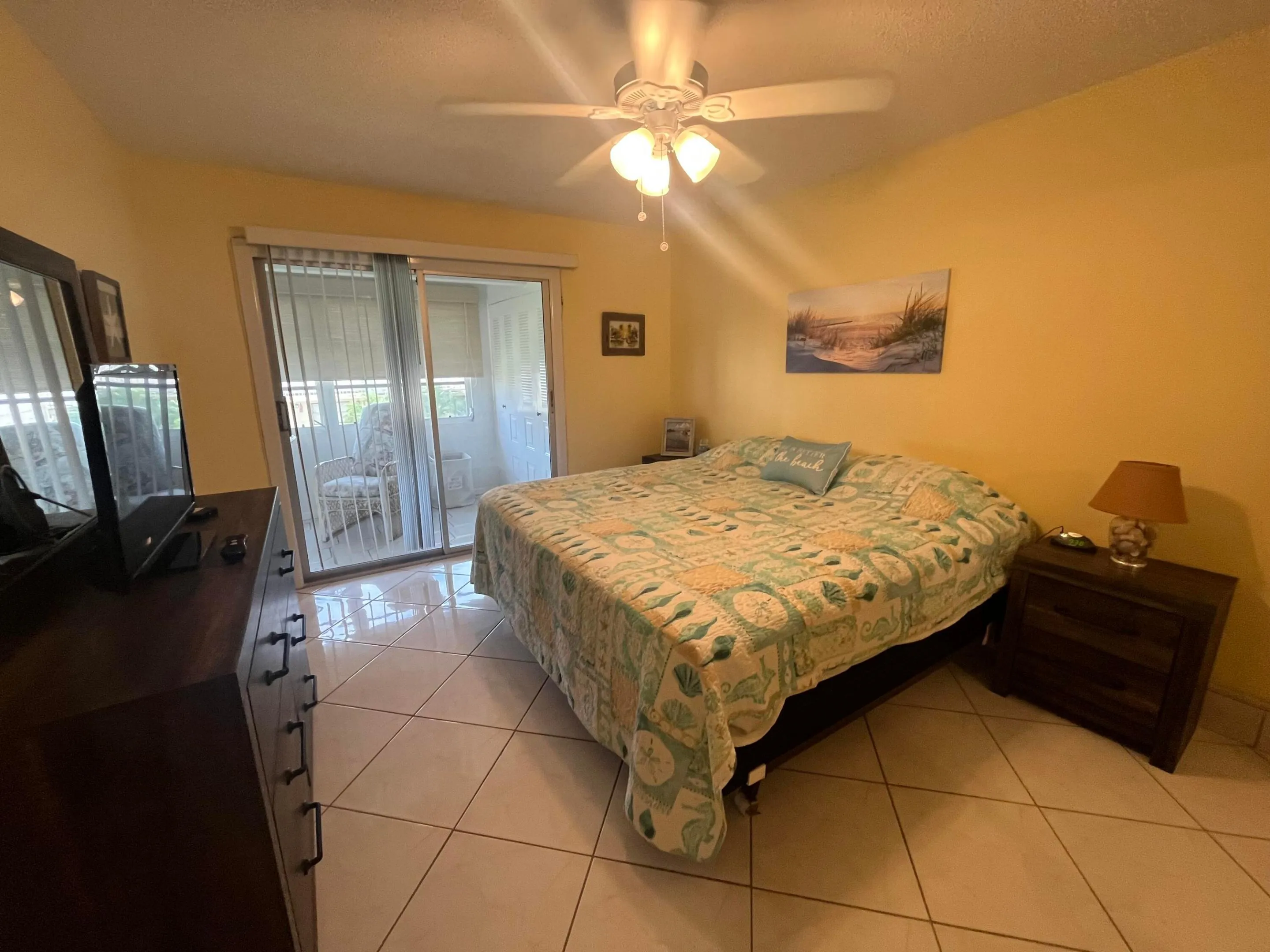 all furnishings come with the unit. Full sliding glass doors replaced a single window within the primary bedroom.