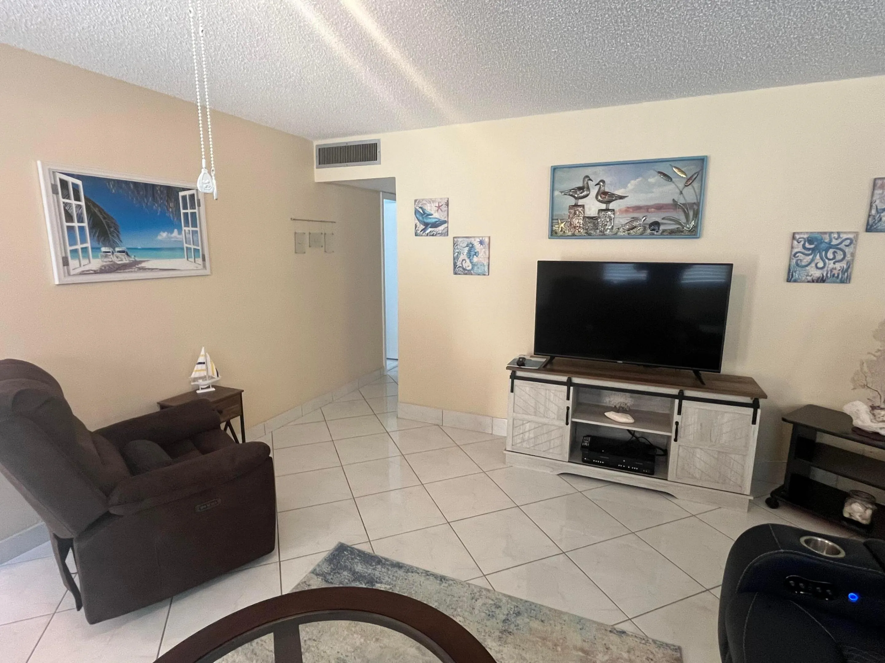 large flat screen t.v. in the living area