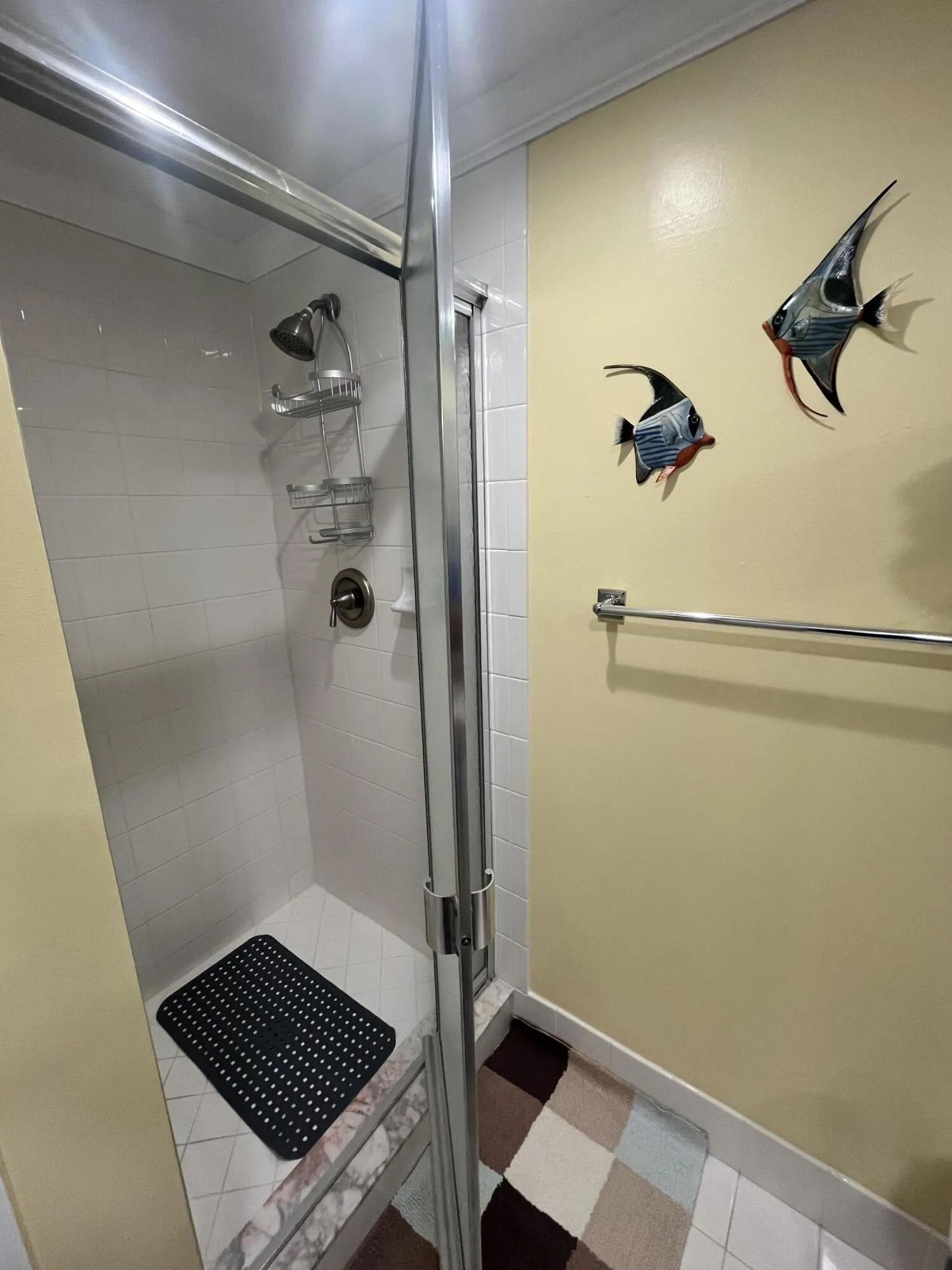 stall shower in the primary bathroom.