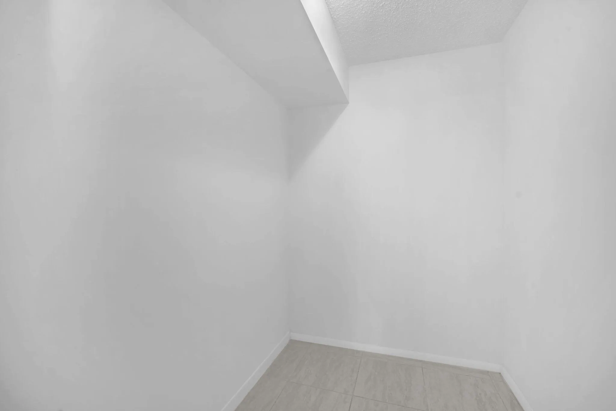 Primary Bedroom walk-in closet