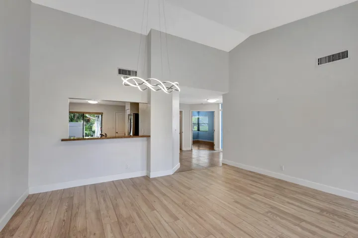 Light fixture in the dining room is excluded.