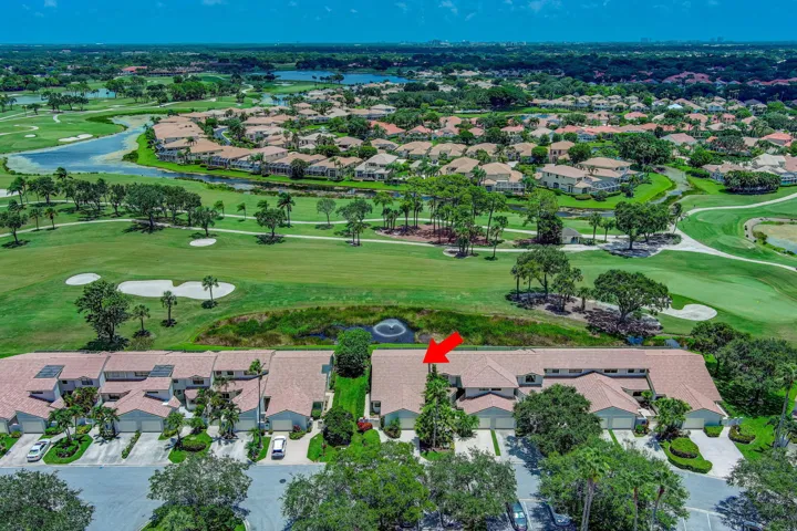Townhome community with tile roofs and an attached garage