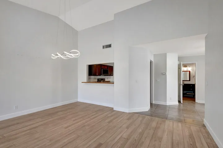 Light fixture in the dining room is excluded.