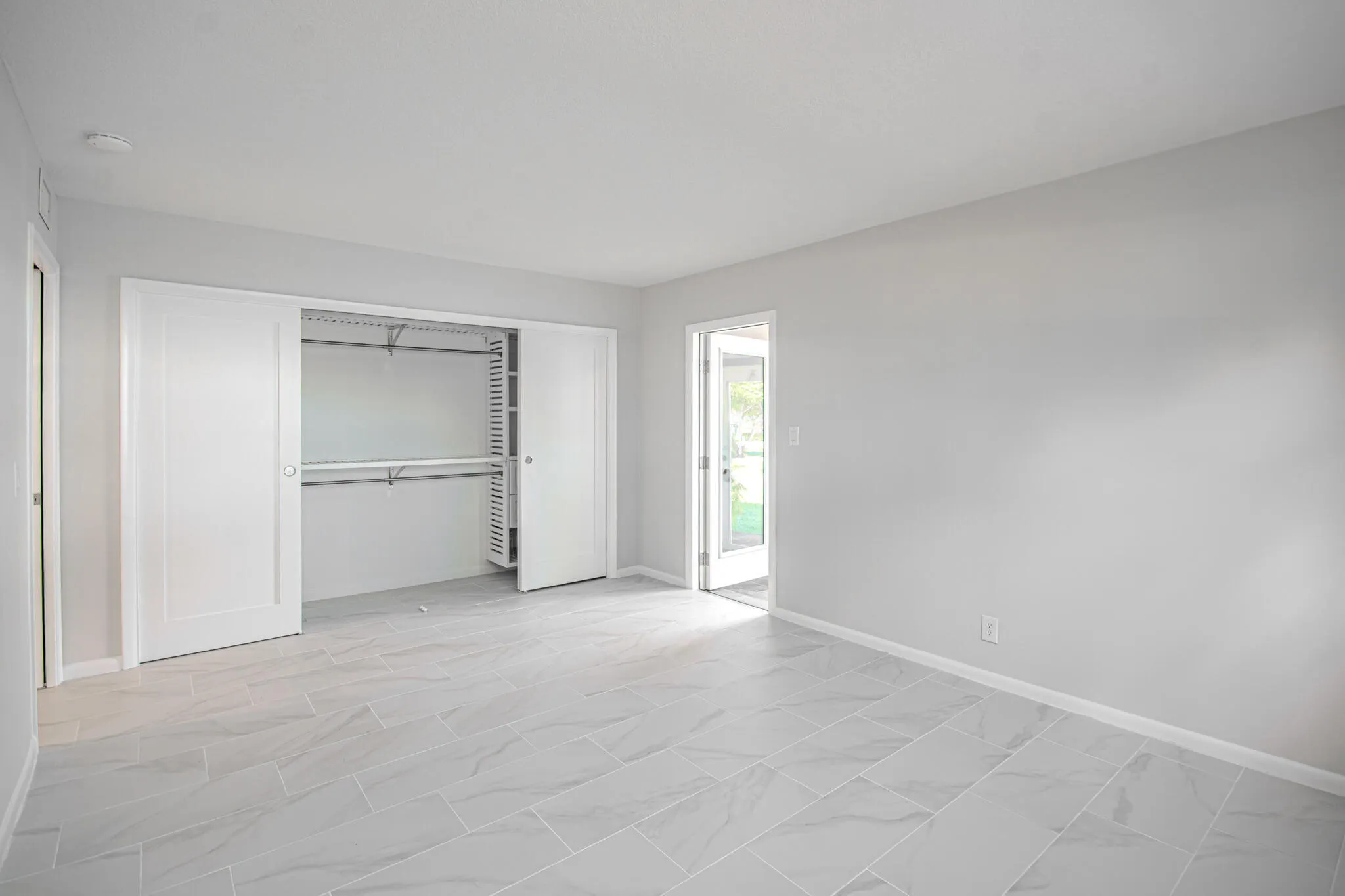 Luxurious Closet with Built in Shelves and Drawers
