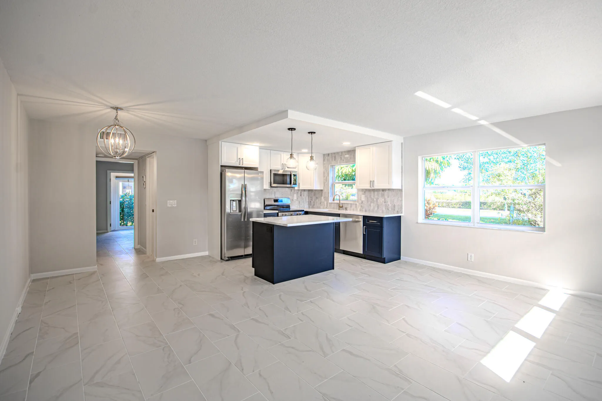 New Tiles - Kitchen walls Removed