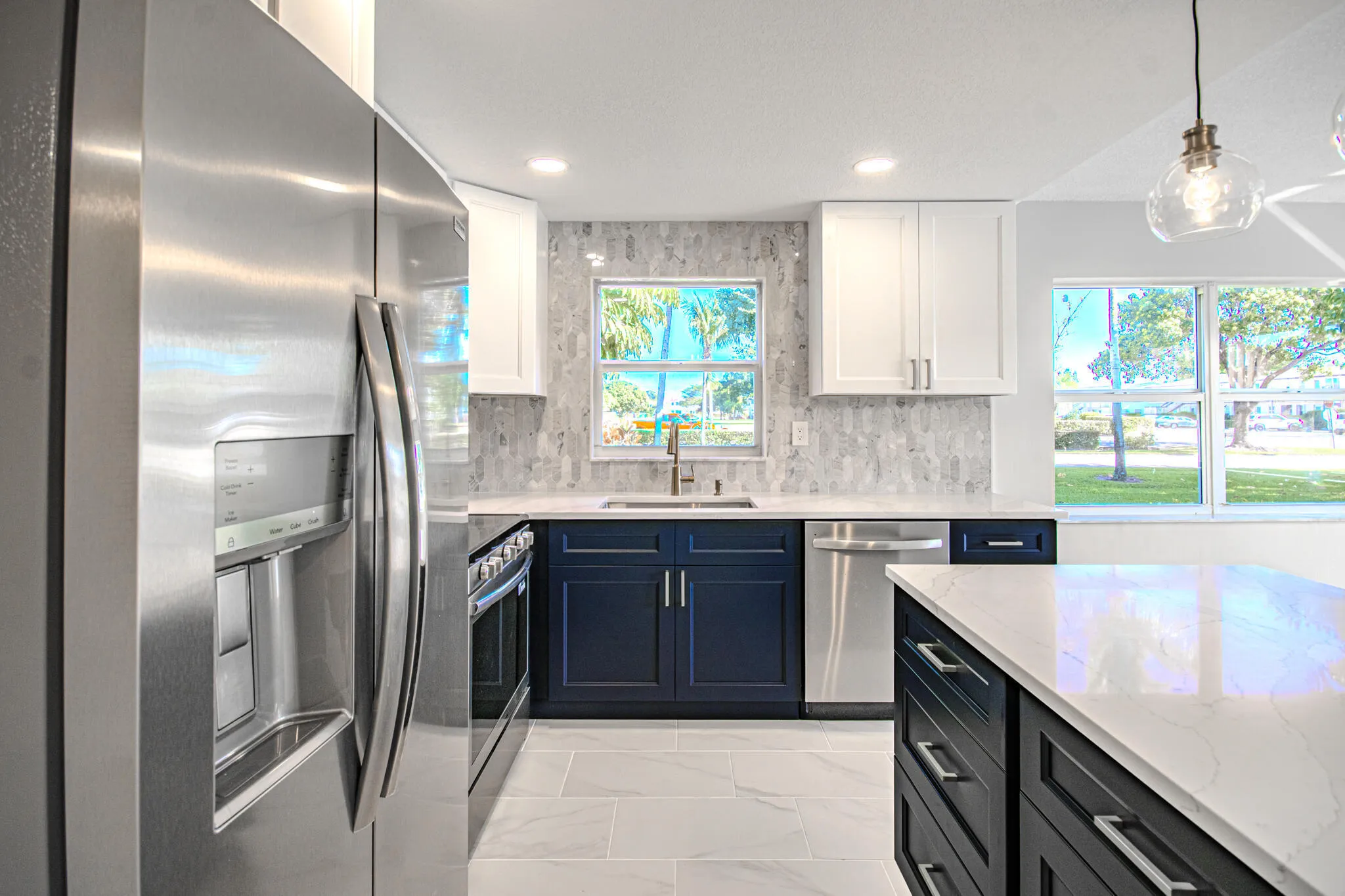 Quartz Countertops and Marble Stone Backsplash