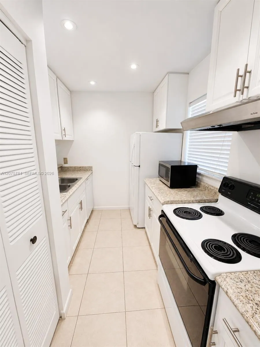 Bright Kitchen with ample Cabinet Space