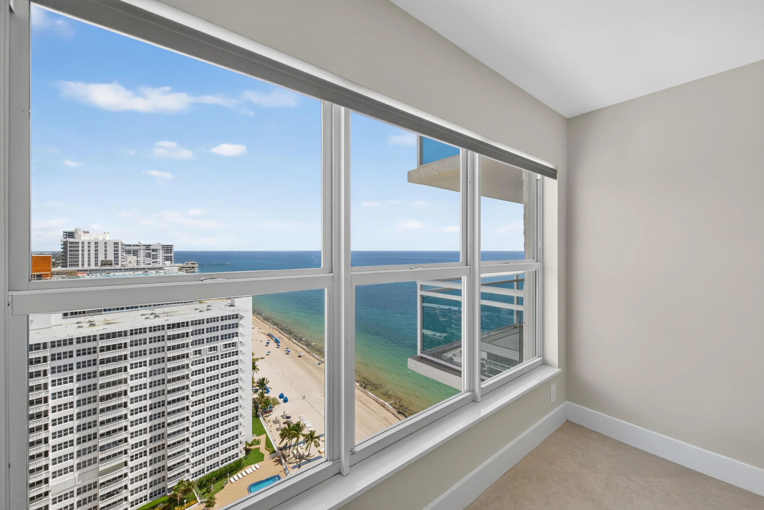High-impact windows showcase sweeping views of the ocean, beach and Fort Lauderdale coastline.